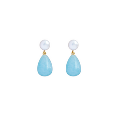 A pair of earrings featuring a pearl bead on top and a teardrop-shaped aquamarine stone hanging below.