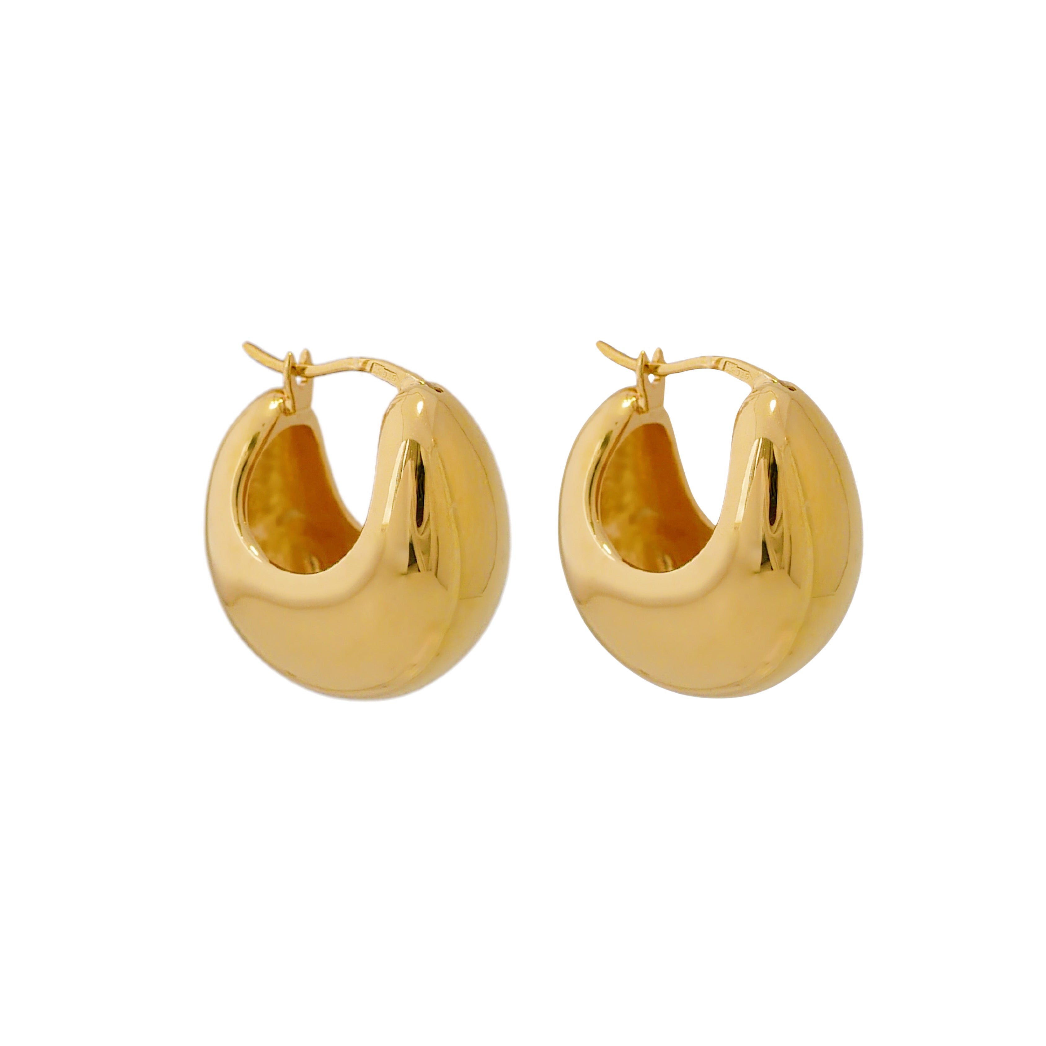 A pair of gold-colored hoop earrings with a curved design.
