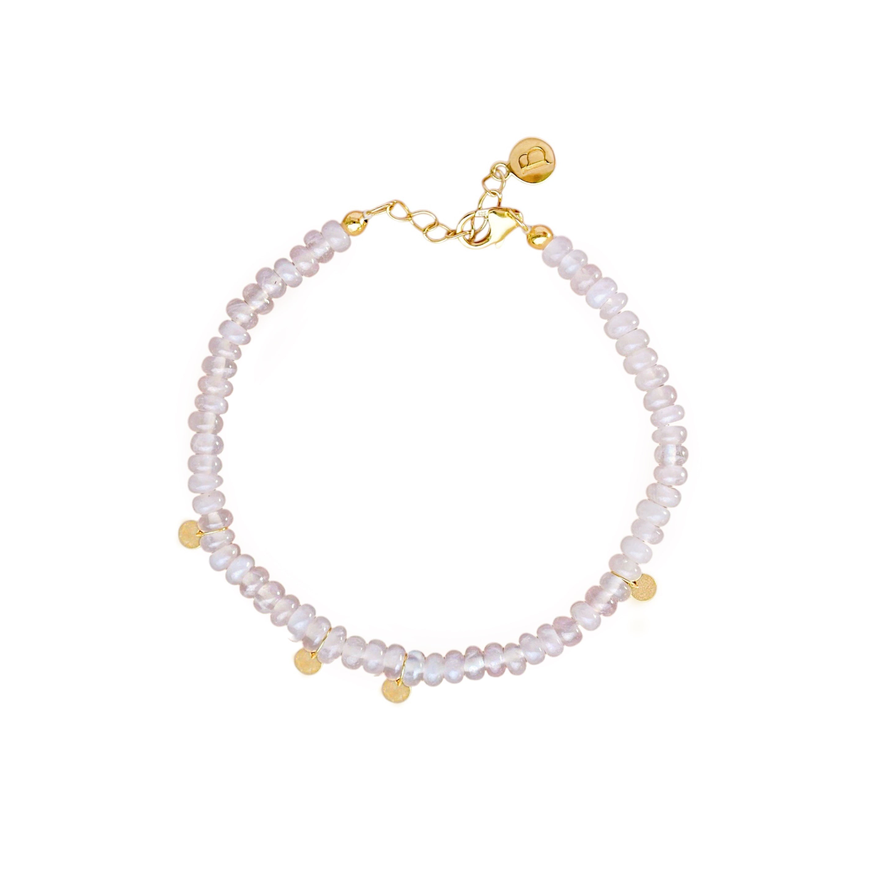 A bracelet with rose quartz beads and gold-colored discs, clasp visible, against a white background.