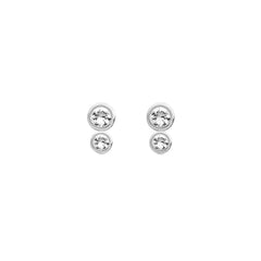Set of four silver stud earrings with clear gemstones on a white background