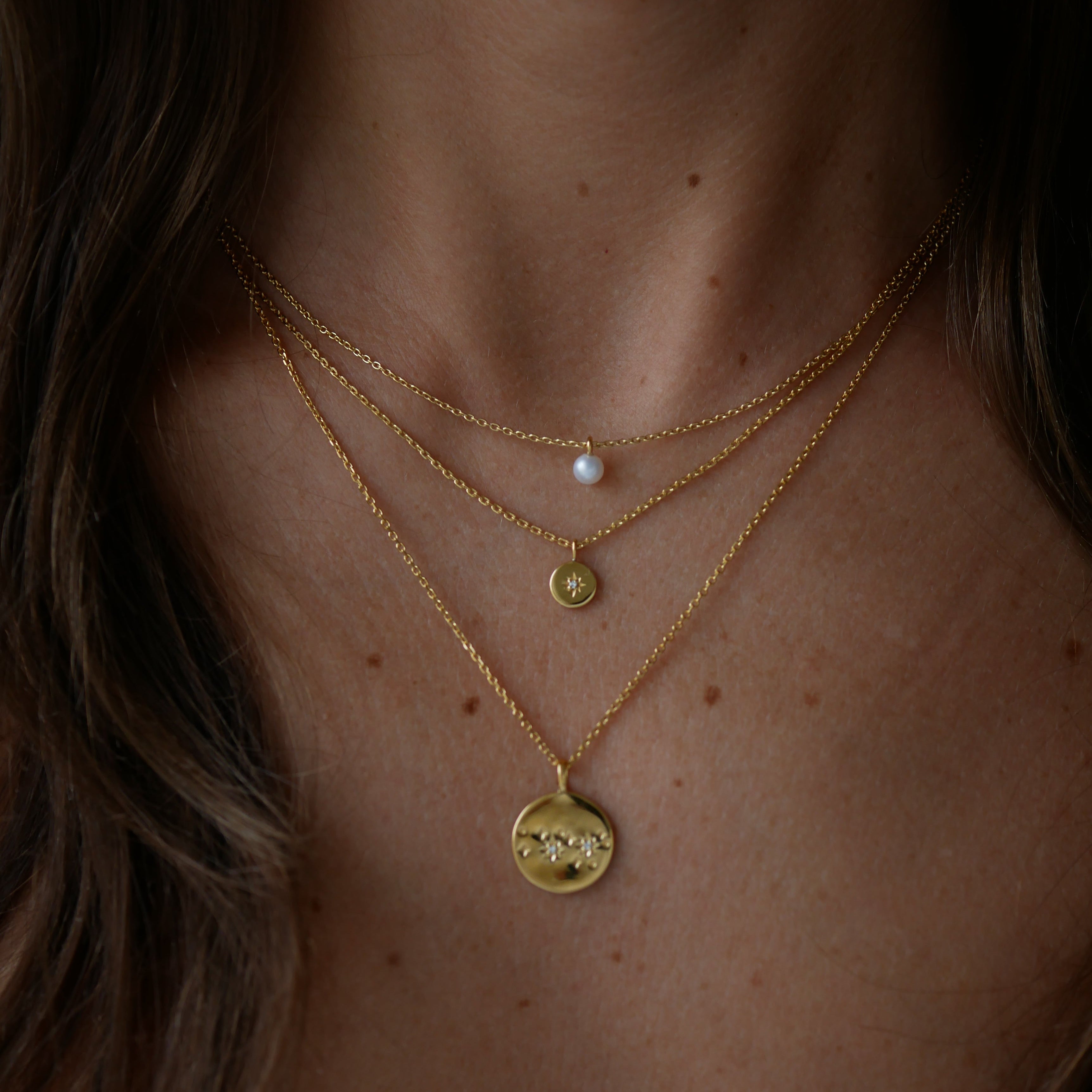 Layers of Birsenaite Necklaces on model 