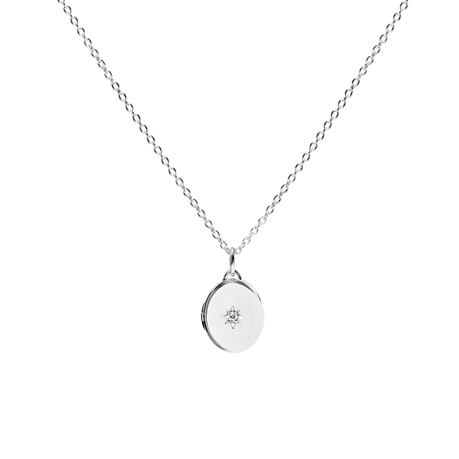 Silver necklace with a round pendant on a white background