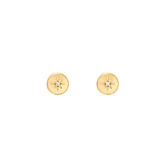 Gold earrings with star design and diamond on a white background
