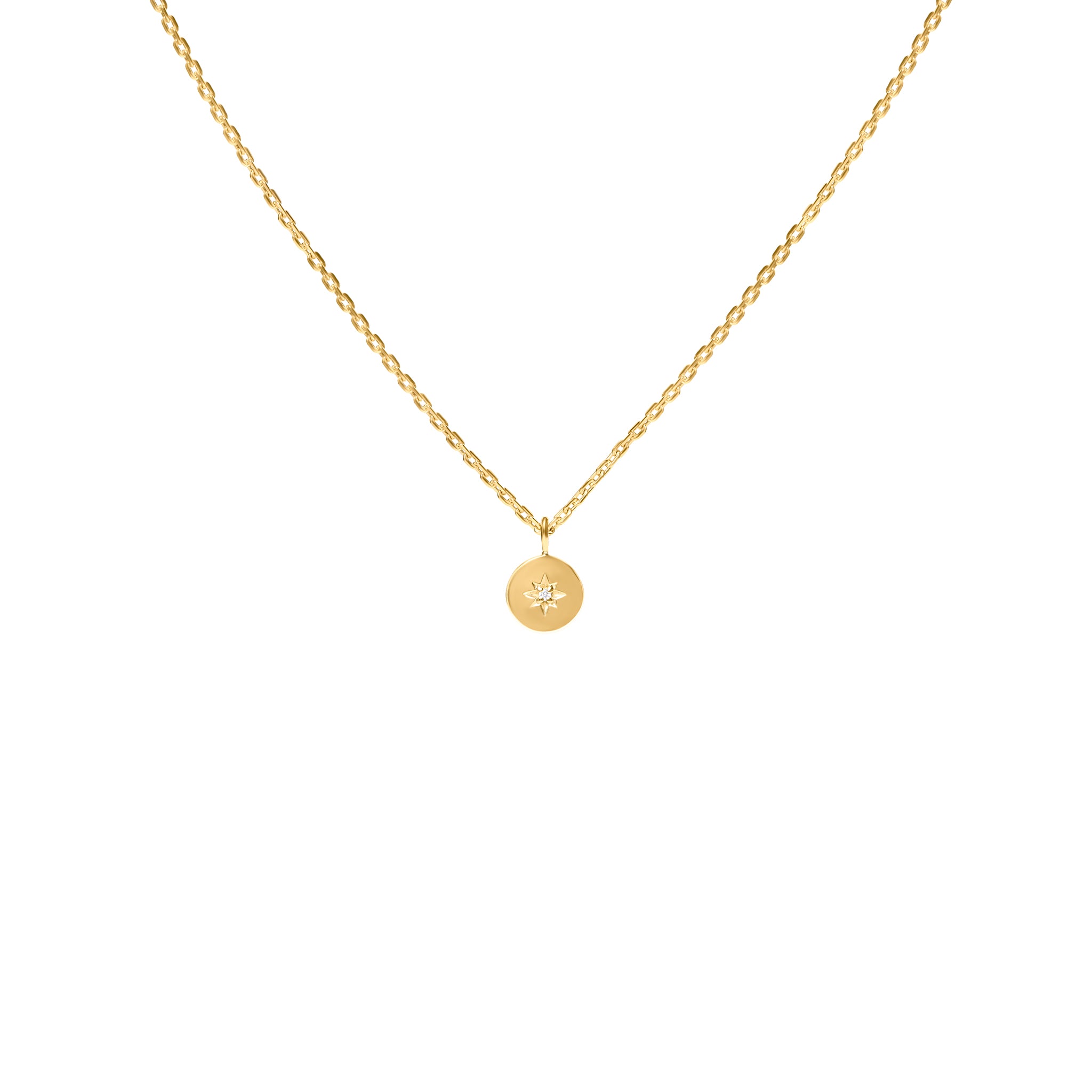 Gold necklace with a round pendant with star , inlaid diamond, on a white background