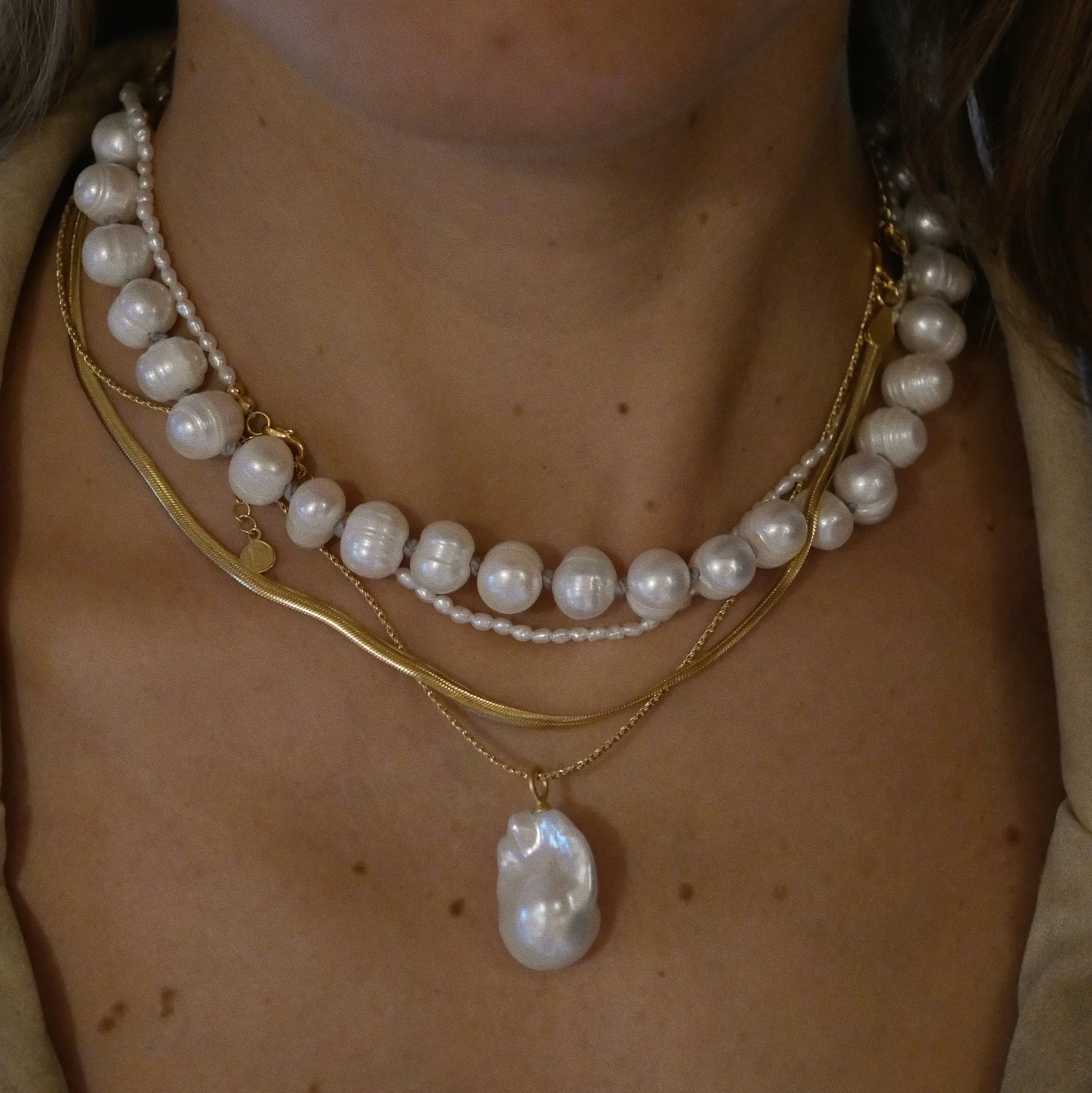 Pearl Collar Necklaces layered on model 